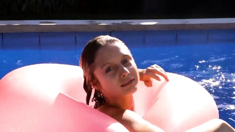 Nude ukrainian babe swimming in the pool