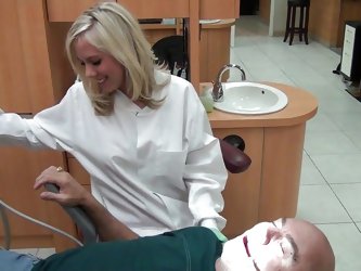 Hot blonde dentist starts getting her...