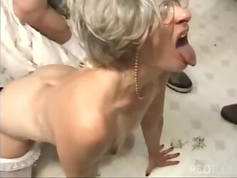 Grandma porn star Kathy Jones in a gangbang.